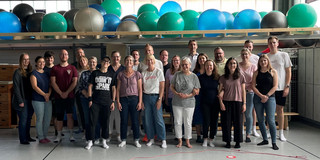  zhb team in the TSC Eintracht hall. Gymnastic balls in the background.